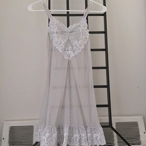 Fantasy Lingerie makes a beautiful Angel like teddy mesh with lace like swirls